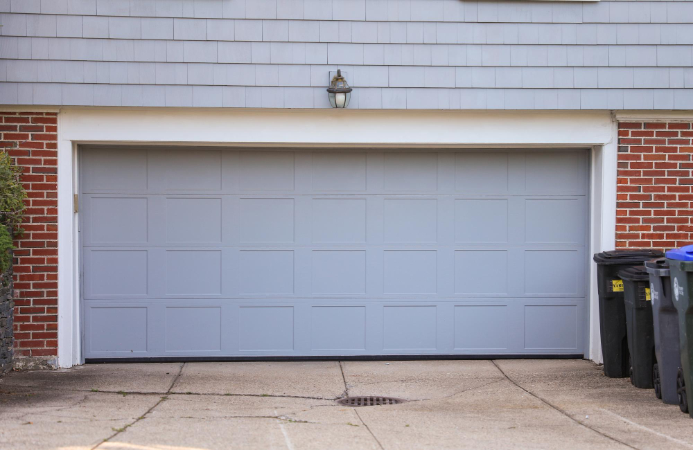 garage door with white garage door that has light it